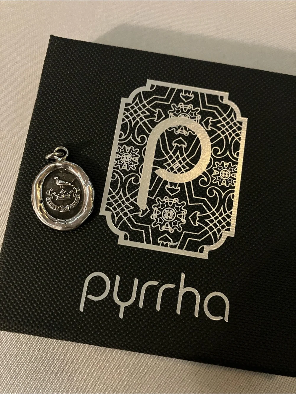 Pyrrha silver talisman bird crown wax seal